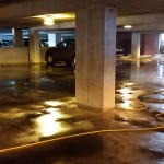 parking garage before pressure washing